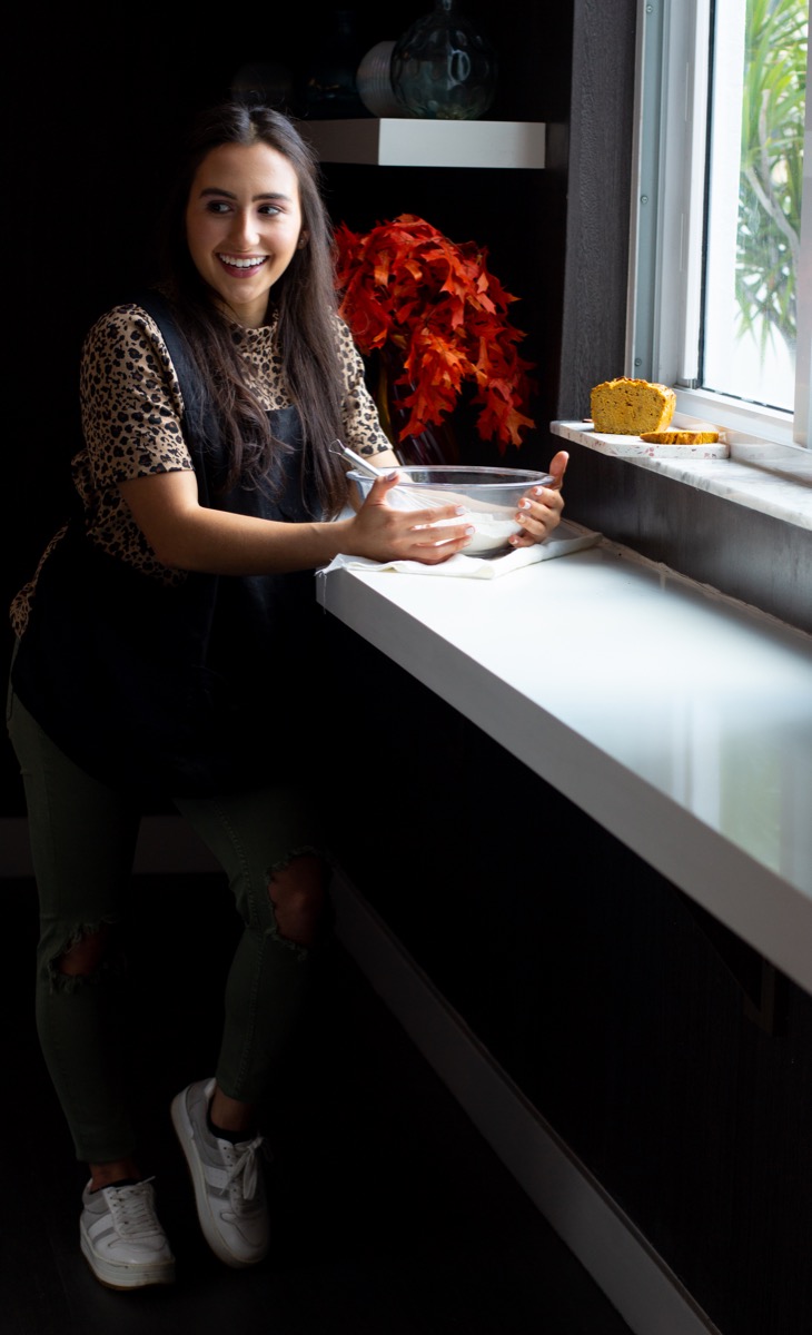 Marisol preparing food in the kitchen
